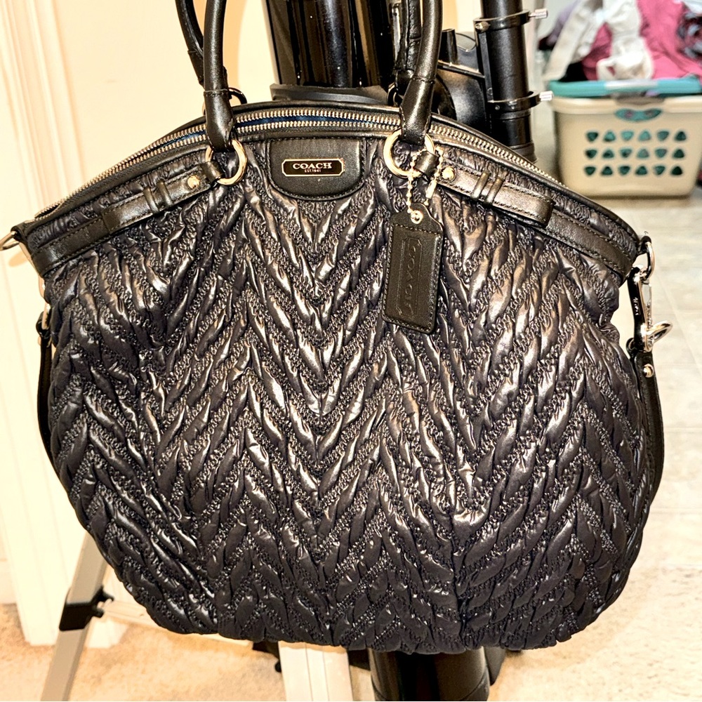 Michael Kors, Coach, and Tory Burch handbags. New and pre loved.